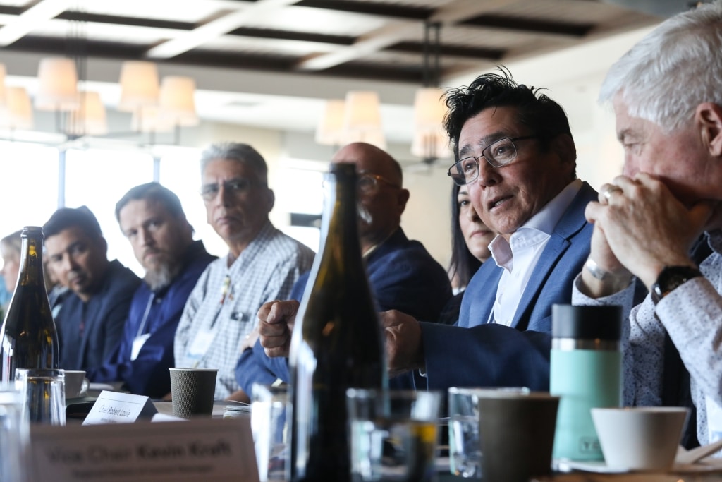 y̓ilmixʷm (Chief) simo Robert Louie, of Westbank First Nation (right), speaks during the Okanagan Similkameen Collaborative Leadership Table’s April 24 meeting in the District of Lake Country, in syilx territory. Photo by Aaron Hemens